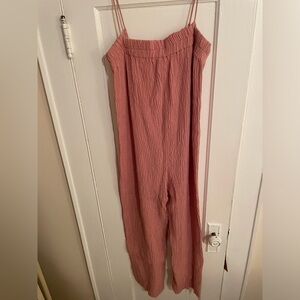 Pink jumpsuit with thin straps